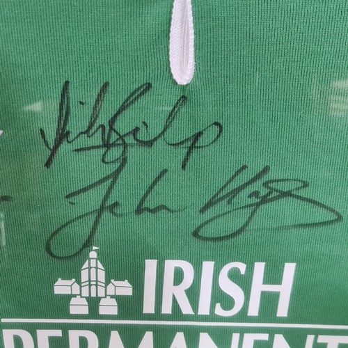 1005 - Star Lot: A very large framed early 2000's signed Irish rugby jersey. Brian O'Driscoll and Paul O'Co... 