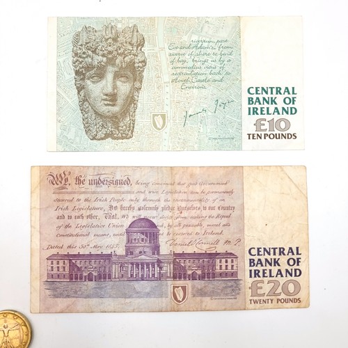 1060 - A £10 and £20 note issued by the Central Bank of Ireland dating to 1993. Featuring James Joyce and D... 