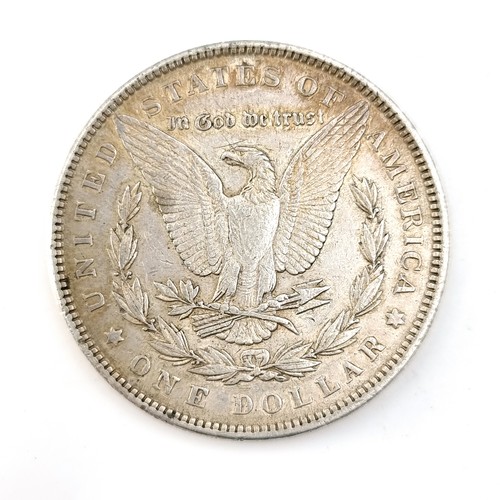 1065 - An 1898 United States of America Morgan silver one dollar coin. In very good condition, lots of deta... 