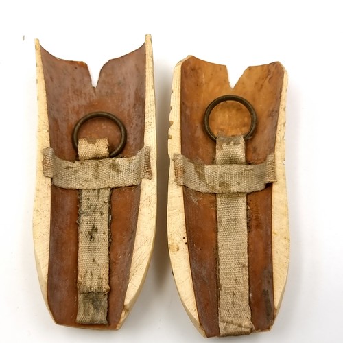 504 - An unusual pair of Japanese antique bone carved  face figures set with ring fix mounts to backs. Dim... 