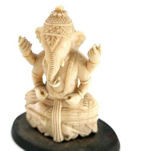 508 - An interesting and unusual antique bone carved Lord Ganesha figure set with further intricate carvin... 