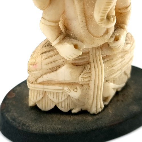 508 - An interesting and unusual antique bone carved Lord Ganesha figure set with further intricate carvin... 