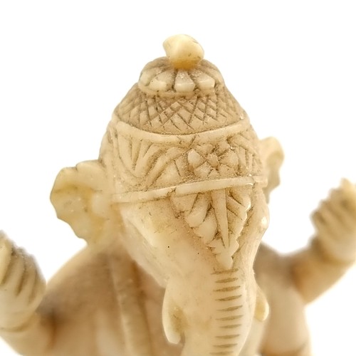 508 - An interesting and unusual antique bone carved Lord Ganesha figure set with further intricate carvin... 