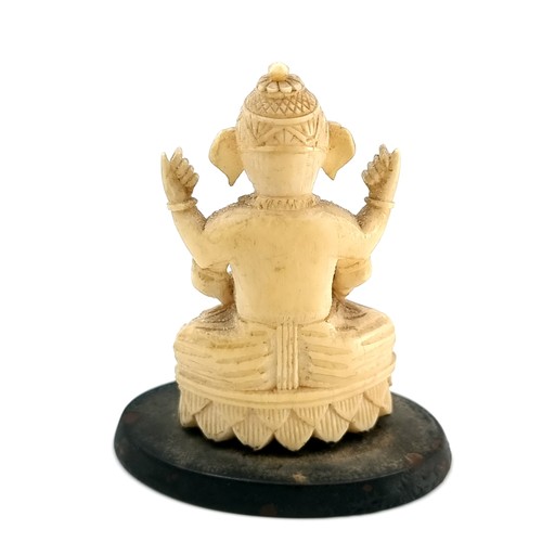 508 - An interesting and unusual antique bone carved Lord Ganesha figure set with further intricate carvin... 