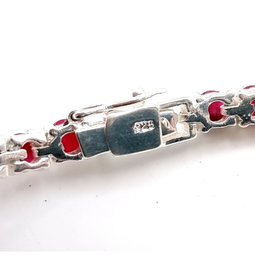 17 - Star Lot : An excellent example of a 17 gram natural Ruby tennis bracelet, set in sterling silver.  ... 