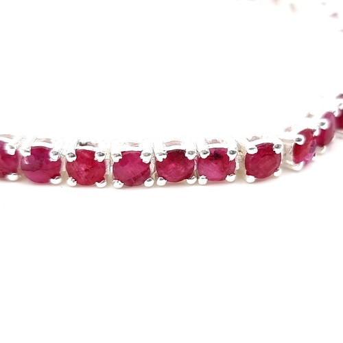 17 - Star Lot : An excellent example of a 17 gram natural Ruby tennis bracelet, set in sterling silver.  ... 