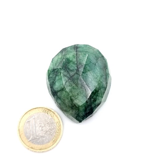 56 - Star Lot : A very large facet cut teardrop natural emerald of 199 carats. Comes with certificate of ... 