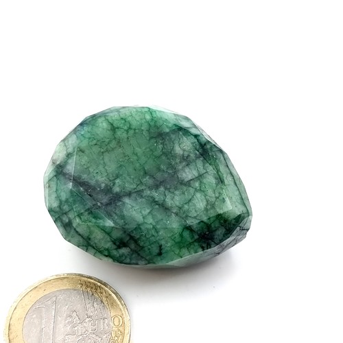 56 - Star Lot : A very large facet cut teardrop natural emerald of 199 carats. Comes with certificate of ... 