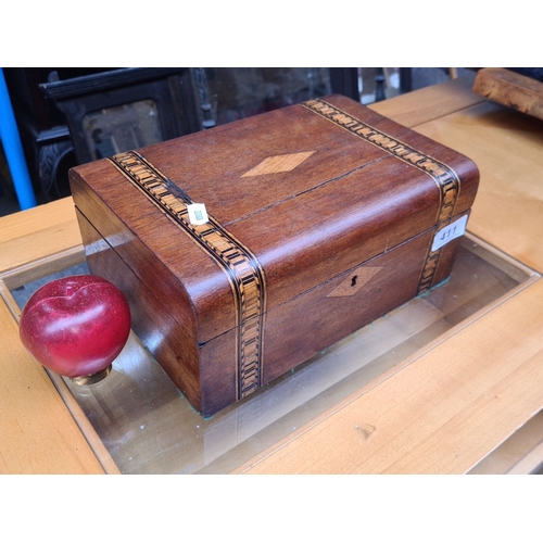 411 - Antique wooden box, intricately inlaid design, likely mid-19th century, interior lined in green fabr... 