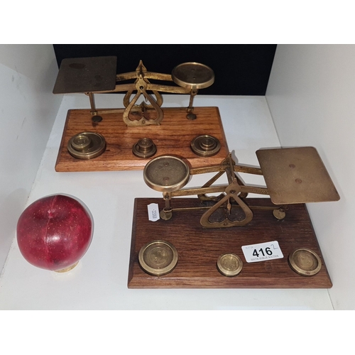 416 - Set of two vintage brass balance scales on wooden bases marked 