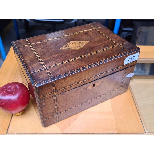 417 - Antique wooden jewelry box with intricate inlay design from the Victorian era. Features a red fabric... 