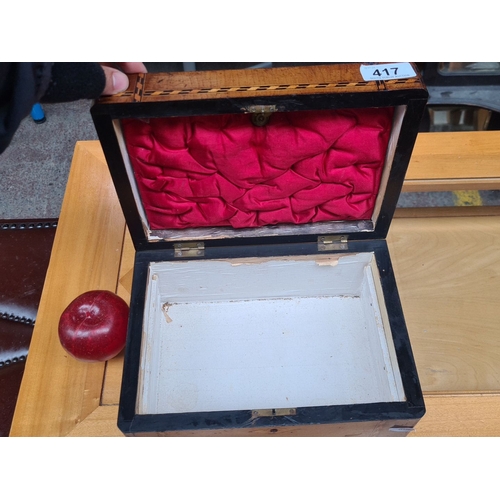 417 - Antique wooden jewelry box with intricate inlay design from the Victorian era. Features a red fabric... 