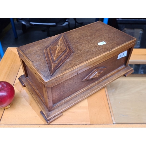 418 - Vintage art deco wooden box with carved diamond motifs. Features a hinged lid that opens to a spacio... 