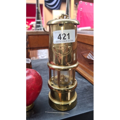 421 - Vintage brass miner’s safety lamp, made in Wales, UK. Features a glass enclosure ,Collectible item.