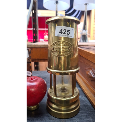 425 - Vintage brass miner's lamp with embossed 