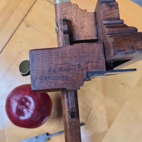 431 - An antique wooden plow plane with brass fittings, signed 