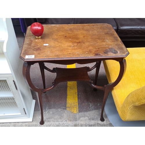 448 - Antique dark wood side table with curved legs and lower shelf, Edwardian period style, possibly maho... 