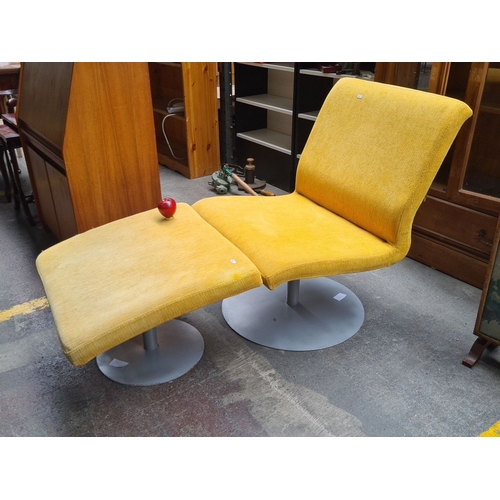 449 - Star lot : Mid-Century Modern yellow swivel lounge chair and ottoman. The chair and ottoman set is b... 