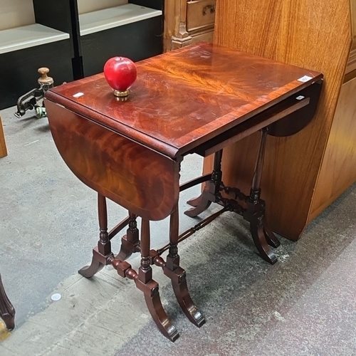 451 - Antique Regency drop-leaf mahogany side table with gateleg support. Features richly grained mahogany... 