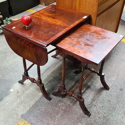 451 - Antique Regency drop-leaf mahogany side table with gateleg support. Features richly grained mahogany... 