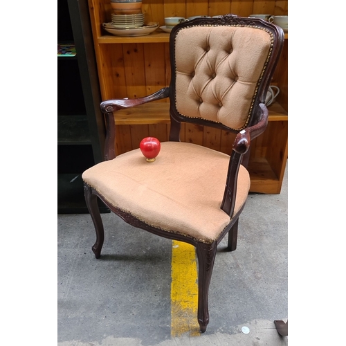 452 - Louis XV style armchair with carved wooden frame and beige upholstered seat and backrest, featuring ... 