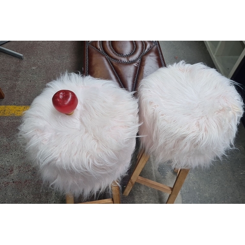 454 - Pair of contemporary fluffy white bar stools with wooden legs. very funky.