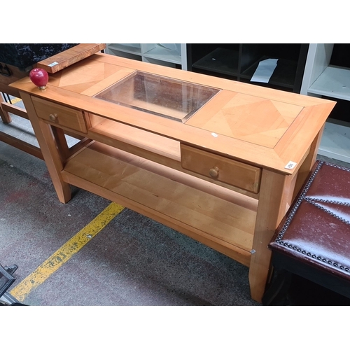 456 - Solid wood console table with a glass display panel and geometric inlay design. Contains two drawers... 