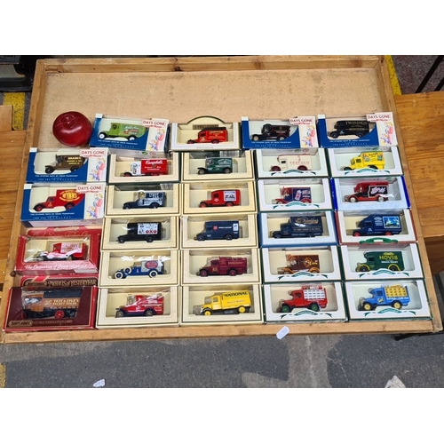 462 - Collection of 26 diecast model vehicles. Includes the 'Days Gone' and 'Model of Yesteryear' series, ... 