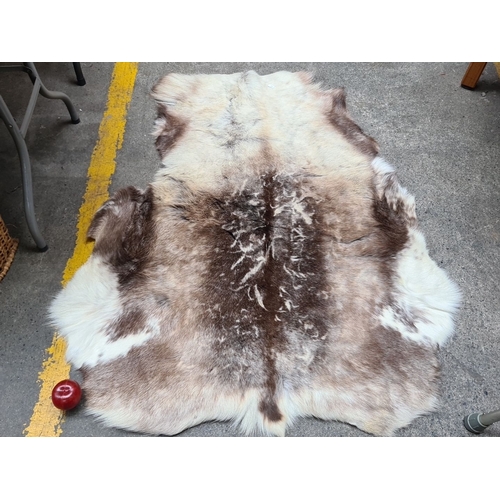 472 - Hanlin Ltd. Reindeer Hide Rug. Eco-friendly natural fur with luxurious markings. Soft, unique hide s... 