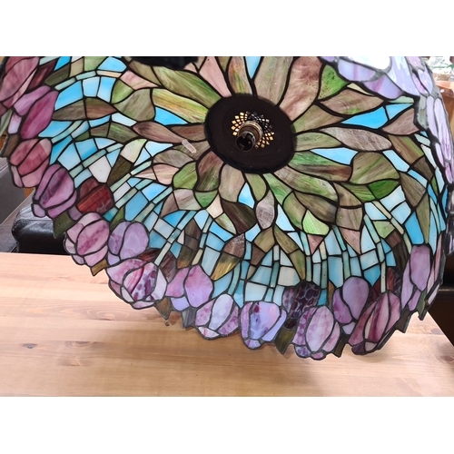 476 - Star lot : A lovely large Art Nouveau-style stained glass lamp shade featuring floral motifs in vibr... 