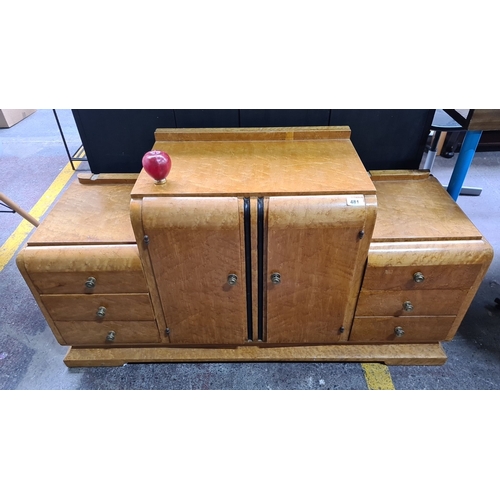 481 - Star Lot : A very funky Art Deco sideboard in light maple veneer, with two central doors flanked by ... 