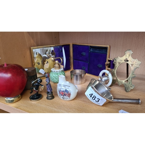 483 - Mixed lot of antiques and collectibles including a brass photo frame, enameled small vase, Anglo-Ame... 