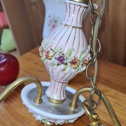 493 - Porcelain and brass chandelier in Victorian-style, embellished with hand-painted floral motifs and t... 