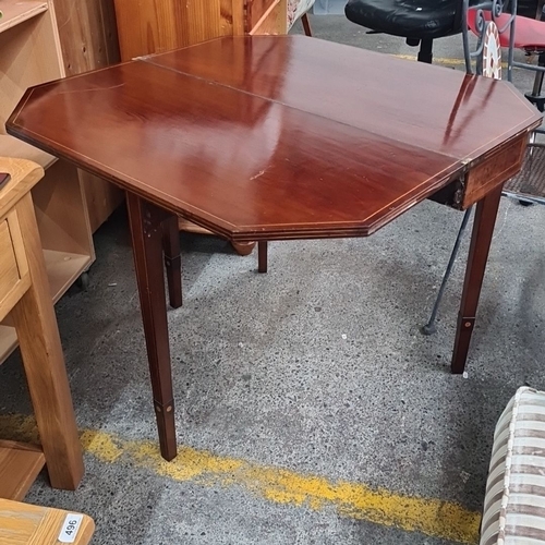 495 - Victorian fold-out oak games table with tapered legs. Unique octagonal design, showcasing craftsmans... 