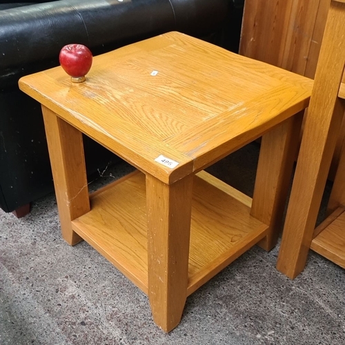 496 - Two Solid oak side tables with square top and lower shelf. Measures approximately 20