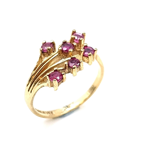 1 - Star Lot : A very pretty Nine carat gold (375) attractive 6 ruby spray design ring. Ring size I. Wei... 