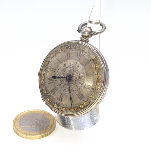 16 - A very pretty antique Sterling Silver with 18ct gold detail fob watch with foliate designed face set... 