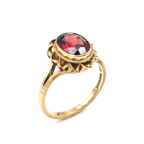 2 - Star Lot : An antique facet cut garnet stone ring set in nine carat gold. Ring size N. Weight 2.79 g... 