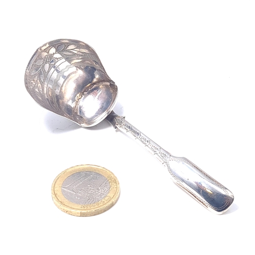 21 - A very unusual Georgian sugar spoon. Hallmarked Birmingham 1812. Dimensions 7cm length / sugar bowl ... 