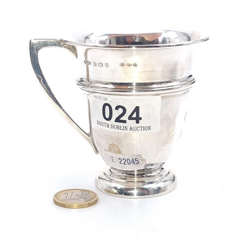 24 - A sterling silver presentation cup set with handle. Hallmarked Birmingham with ribbed body, initiale... 