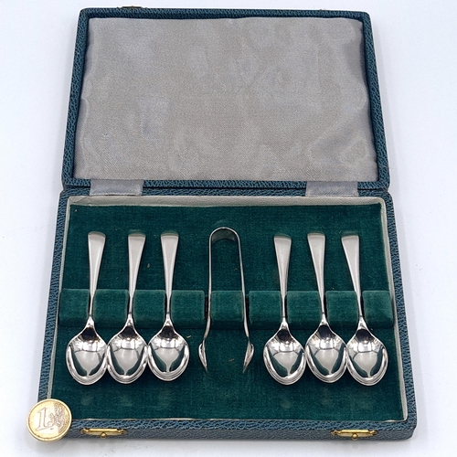 33 - A set of six Settling silver teaspoons with a pair of sugar tongs. Hallmarked Sheffield. Dimensions ... 