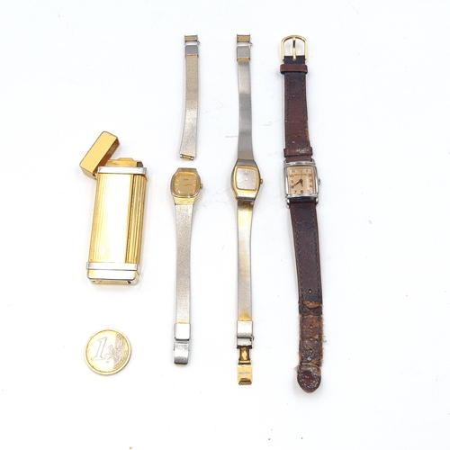 41 - A collection of items consisting of a machine cut bodied gold tone cigarette lighter by Colibri, tog... 