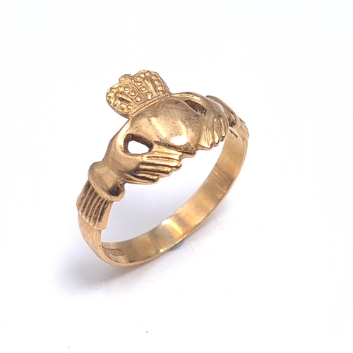 50 - A vintage  gents nine carat gold 375 Claddagh ring. Size S. Weight 3.20 grams.