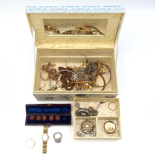 56 - A vintage jewellery box comprising of an assortment of items such as watches, rings, brooches, and n... 