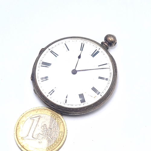 59 - A sterling silver fob watch with white enamel face an roman numeral dial and antique hands. Features... 