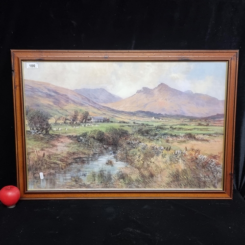 100 - A large vintage print from a oil painting of an Irish landscape. Housed in a wood and gilt frame beh... 