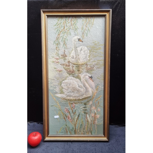 141 - A charming vintage needlepoint tapestry. Features swans and ducklings in a serene lake. Beautiful ac... 