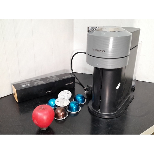 609 - Nespresso Vertuo Coffee Machine, Model: Magimix M700, Dark Grey. Includes assorted capsules. Made in... 