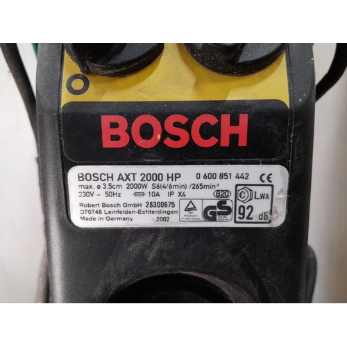 612 - Bosch AXT 2000 HP electric garden shredder. 2000W max power, handles branches up to 3.5cm diameter. ... 