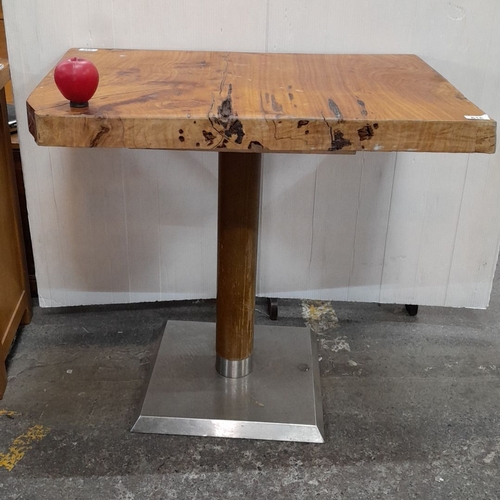 616 - Rustic wooden table with natural grain top on a metal pedestal base. Approximate dimensions: 30